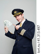 Young man in the form of a passenger plane pilot. Стоковое фото, фотограф Андрей Аркуша / Фотобанк Лори