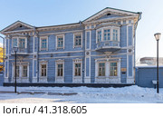 IRKUTSK, RUSSIA -January 01, 2023: City landmark - Volkonsky Manor House - famous Historical and Memorial Museum of the Decembrists at winter cold sunny day. Редакционное фото, фотограф Виктория Катьянова / Фотобанк Лори