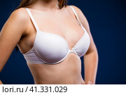 Woman breast in white uplift. Стоковое фото, фотограф Андрей Аркуша / Фотобанк Лори
