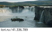 Beautiful Godafoss waterfall in sunset scene, Iceland. Стоковое видео, видеограф Igor Tichonow / Фотобанк Лори