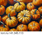 Decorative ornamental orange pumpkins. A jack-o'-lantern or jack o'lantern. Halloween or Hallowe'en, Allhalloween, All Hallows' Eve, or All Saints' Eve. Bright vegetable background - still life. Стоковое AI-изображение, AI-художник Юлия Петровская / Фотобанк Лори