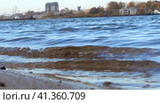 River. Beautiful lapping waves near the shore. Video with sound of water noise and waves lapping. Река. Красивые плещущиеся волны у берега. Видео со звуком шума воды и плеска волн. Стоковое видео, видеограф Egor Sarantstv / Фотобанк Лори