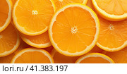 Sliced orange slices. Fruit background. Generated by AI. Стоковое AI-изображение, AI-художник Ярославский Максим / Фотобанк Лори
