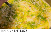 Cheddar cheese soup. Vegetables carrot, potatoes, herbs boiled in a thick broth. White Soup boiling in a saucepan. Preparing Bouillon. Cooking cream broth, making in a steel pot in a kitchen Close-up. Стоковое видео, видеограф Марина Демидюк / Фотобанк Лори