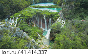 Summer landscape with waterfalls in Plitvice Lakes National Park Croatia. Mountain landscape with many streams of water. Стоковое фото, фотограф Igor Tichonow / Фотобанк Лори