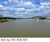 Bratislava, Slovakia - 10 Jun 2011: The bridge on Danube river in Bratislava, Slovakia. Редакционное фото, фотограф Сергей Стрелков / Фотобанк Лори