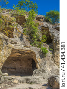 The remains of a medieval fortress city (according to other sources - a monastery) Tepe-Kermen, covering the upper part of the mountain in several tiers (2020 год). Стоковое фото, фотограф Анна Кривицкая / Фотобанк Лори