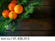 High angle view of tangerines on wooden background. Стоковое фото, фотограф Галина Царькова / Фотобанк Лори