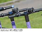 Short-term rental service for electric scooters in Moscow, Russia. Стоковое фото, фотограф Володина Ольга / Фотобанк Лори