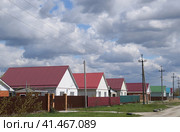 The roof of corrugated sheet on the houses. Стоковое фото, фотограф Леонид Еремейчук / Фотобанк Лори