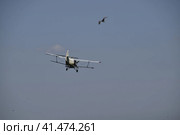 The spraying of fertilizers and pesticides on the field with the aircraft. Стоковое фото, фотограф Леонид Еремейчук / Фотобанк Лори