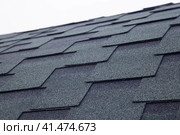 Soft roof, flexible shingles. Installation of soft tiles on the roof. Стоковое фото, фотограф Александр Поташев / Фотобанк Лори