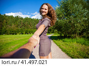 Follow me, Beautiful young woman holds the hand of a man. Стоковое фото, фотограф Андрей Аркуша / Фотобанк Лори