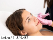 Young woman having mesotherapy procedure on her face. Стоковое фото, фотограф Яков Филимонов / Фотобанк Лори