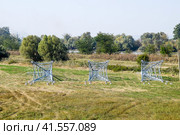 Assembled power transmission line supports, ready for installation. Стоковое фото, фотограф Леонид Еремейчук / Фотобанк Лори