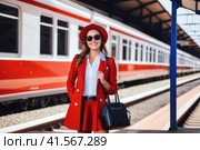 happy girl on railway station perron. AI. Стоковое AI-изображение, AI-художник Sergey Grishin / Фотобанк Лори