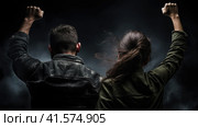 A man and a woman are fighting for their rights. Стоковое AI-изображение, AI-художник Кирилл Черезов / Фотобанк Лори