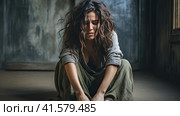 A tired, depressed woman sits on the floor and looks thoughtfully at the camera. Generated by AI. Стоковое AI-изображение, AI-художник Ярославский Максим / Фотобанк Лори