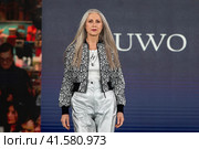 Показ одежды из коллекции российского бренда одежды RUWO в рамках фестиваля детской моды Kids Fashion Week в "Центральном детском магазине на Лубянке" (ЦДМ) в центре города Москвы, Россия (2023 год). Редакционное фото, фотограф Николай Винокуров / Фотобанк Лори