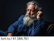 Portrait of an elderly man with a large gray beard and lush hair on his head with a thoughtful look. Dark background.Generated by AI. Стоковое AI-изображение, AI-художник Ярославский Максим / Фотобанк Лори