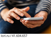 women's hands that confidently hold a smartphone, modern technology. Стоковое фото, фотограф Андрей Знаменский / Фотобанк Лори