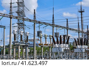Outdoor power plant, close-up. Electrical substation with power transformers and measuring elements. Стоковое фото, фотограф Андрей Журавлев / Фотобанк Лори