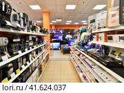 Moscow, Russia - Oct 19. 2023. TVs and coffee makers in DNS network store selling household appliances in Zelenograd. Редакционное фото, фотограф Володина Ольга / Фотобанк Лори
