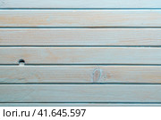 Деревянный фон из параллельных линий узких досок вагонки со слабым непрокрашенным голубым цветом. Крупный план. Стоковое фото, фотограф Sergei Gorin / Фотобанк Лори