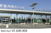 Podgorica, Montenegro - June 27, 2019. Passenger terminal of Podgorica airport in Montenegro. Sunny summer view. Редакционное видео, видеограф Александр Кузнецов / Фотобанк Лори