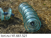 High-voltage insulators of glass insulators. Installation of high-voltage power lines. Стоковое фото, фотограф Леонид Еремейчук / Фотобанк Лори