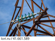 Glass prefabricated high voltage insulators on poles high-voltage power lines. Electrical industry. Стоковое фото, фотограф Леонид Еремейчук / Фотобанк Лори