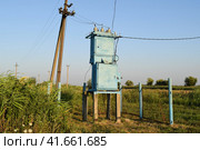 Transformers for voltage conversion. Power infrastructure. The old equipment. Стоковое фото, фотограф Леонид Еремейчук / Фотобанк Лори