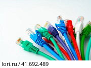 Colorful network cables switch on white background. Стоковое фото, фотограф Сергей Толмачёв / Фотобанк Лори