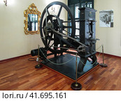 Cetinje, Montenegro - June 24, 2019. Old Austro-Hungarian coin machine in Money Museum of Cetinje. Старинный австро-венгерский аппарат для чеканки монет. Стоковое фото, фотограф Александр Кузнецов / Фотобанк Лори