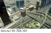 Panoramic aerial view of urban highway Dubai city, UAE. (2023 год). Стоковое видео, видеограф Aleksandr Golubev / Фотобанк Лори