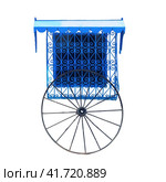 White wall, blue window with lattice ornament and wheel in Sidi Bou Said, Tunisia, isolated on a white background. Стоковое фото, фотограф Андрей Журавлев / Фотобанк Лори