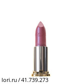 Moscow, Russia - Nov 17. 2023. Loreal Paris Pink pearlescent lipstick on a light background. Редакционное фото, фотограф Володина Ольга / Фотобанк Лори