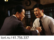 Furious businessman experiences intense anger and frustration when his partner violates agreements. Стоковое AI-изображение, AI-художник Юрий Поздников / Фотобанк Лори