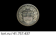 Реверс старинной монеты Венгрии 1 крона 1915 года, черный фон. Reverse of Hungary coin 1 korona 1915, isolated in black background. 4k video. Стоковая анимация, аниматор Александр Кузнецов / Фотобанк Лори