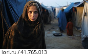 Portrait of Refugees on middle east looking at camera. Homeless people, unhappy and frightened, shawl camps,  Generative AI. Стоковое AI-изображение, AI-художник Анна Кривицкая / Фотобанк Лори