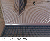 A view from above on the roof of the house. The roof of corrugated sheet. Roofing of metal profile wavy shape. Стоковое фото, фотограф Леонид Еремейчук / Фотобанк Лори