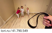 Three little girls, sisters, triplets, misbehaved and were afraid of punishment. Стоковое видео, видеограф German Zvyagin / Фотобанк Лори