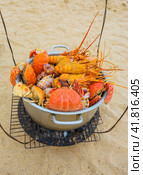 Sale of cooked seafood on the beach in Nha Trang (2014 год). Стоковое фото, фотограф Олег Жуков / Фотобанк Лори