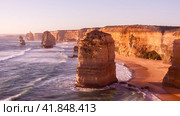 Twelve Apostles Sea Rocks near Great Ocean Road on the sunset, Port Campbell National Park, Australia. Pink filter (2009 год). Стоковое фото, фотограф VittoriaChe / Фотобанк Лори