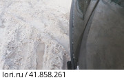 A view of a car wheel skidding in deep snow. Slow motion. Стоковое видео, видеограф Ярославский Максим / Фотобанк Лори