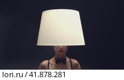 Submissive lady roleplaying floor lamp serving champagne. Стоковое видео, видеограф Гурьянов Андрей / Фотобанк Лори