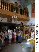 Russia Samara June 25, 2011: Orthodox parishioners came to baptize their babies in the church. Редакционное фото, фотограф Акиньшин Владимир / Фотобанк Лори
