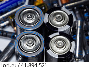 Salt and alkaline batteries, source of energy for portable technology. AAA and AA batteries. Стоковое фото, фотограф Леонид Еремейчук / Фотобанк Лори
