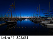 PLAYA BLANCA, LANZAROTE - OCTOBER 25, 2023: Evening on Marina Rubicon of Playa Blanca. Playa Blanca is the southernmost town of the Spanish island of Lanzarote. It is the newest resort on the island. Редакционное фото, фотограф Sergey Kohl / Фотобанк Лори