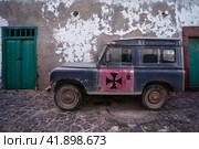 TEGUISE (village), LANZAROTE, CANARY ISLANDS - OCTOBER 26, 2023: Short-wheelbase Land Rover series III on the streets of the historic center of the village Teguise. Редакционное фото, фотограф Sergey Kohl / Фотобанк Лори